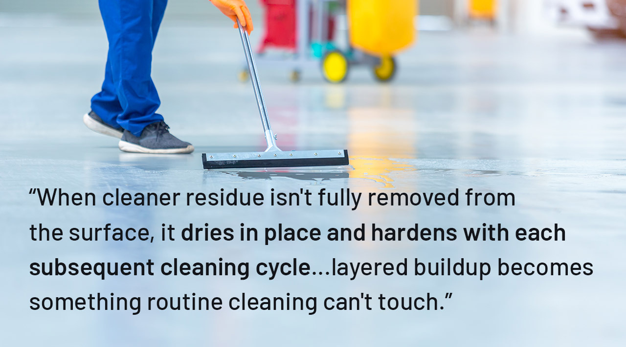 Custodian with a mop running a rinse pass on a hard floor Custodian with a mop running a rinse pass on a hard floor